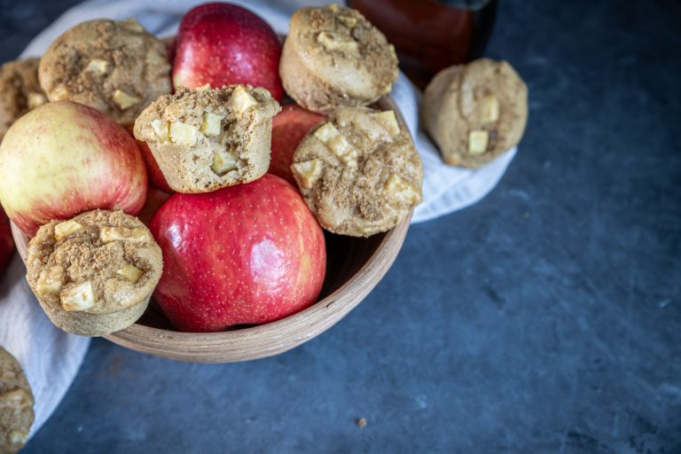 Apple Cinnamon Muffins in a bowl of apples