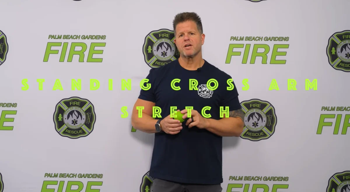 Standing cross arm stretch